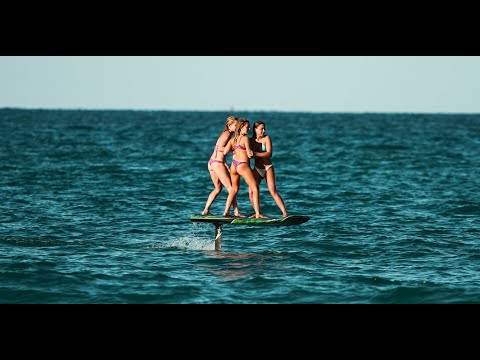 Three GIRLS ride one FOIL.