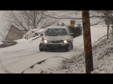 Cars slip and slide down icy hill - Charleston, WV - February 27, 2008