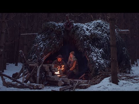 Winter Camping in Bushcraft Shelter - Spruce Bough Bed, Long Log Fire, Camp Cooking