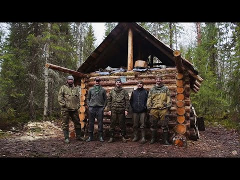 Build log cabin in taiga. Five men live in the taiga. Part II